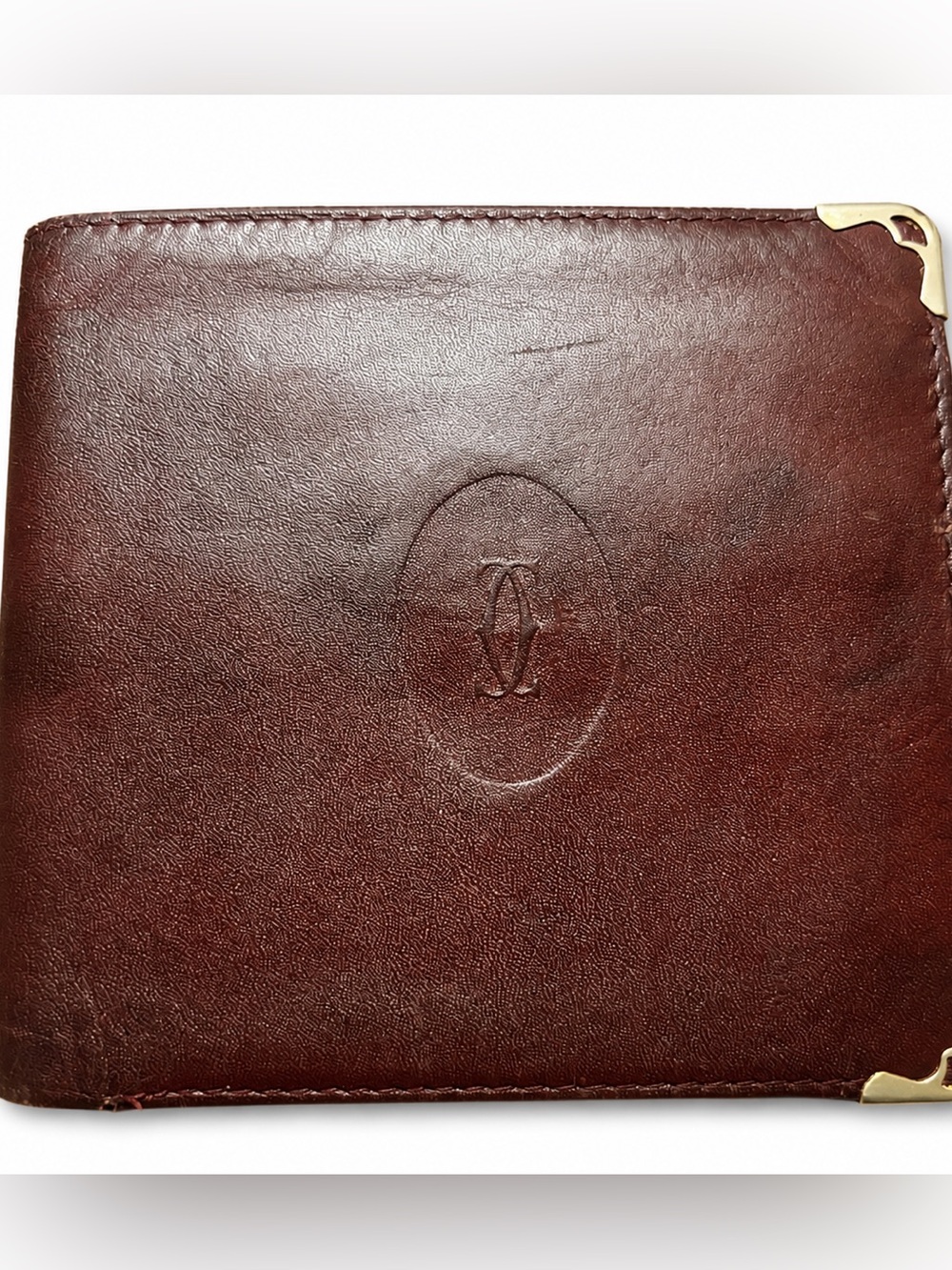 Cartier Bordeaux Leather with Gold Corners Callouts Rehab